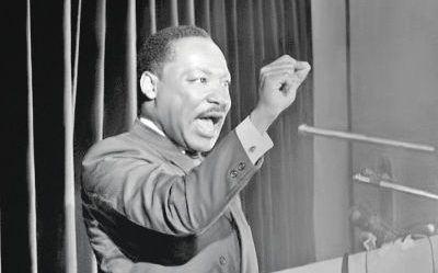 Martin Luther King speaks to an audience in Gross Pointe