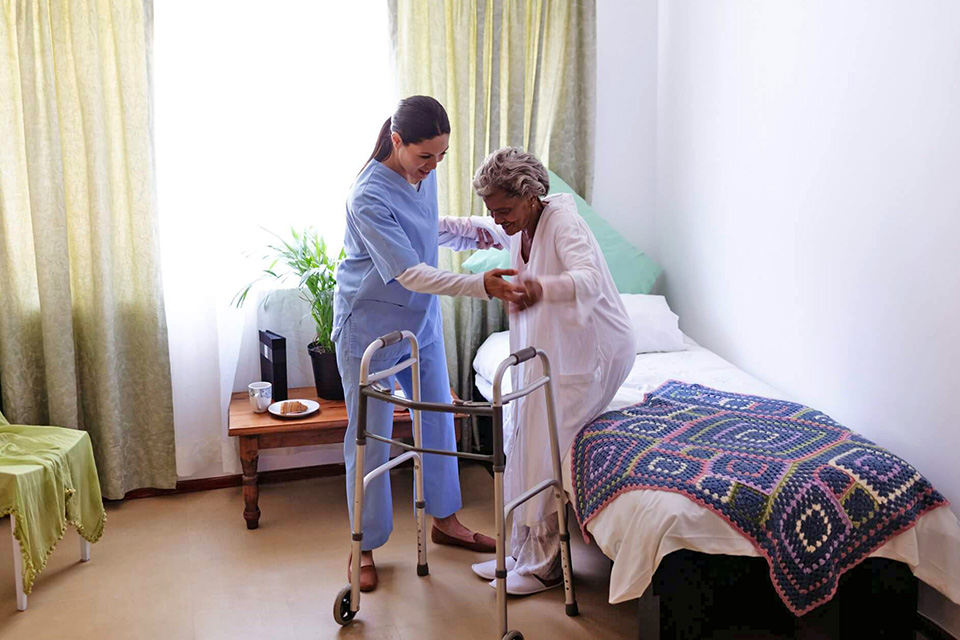 Nursing assistant with patient